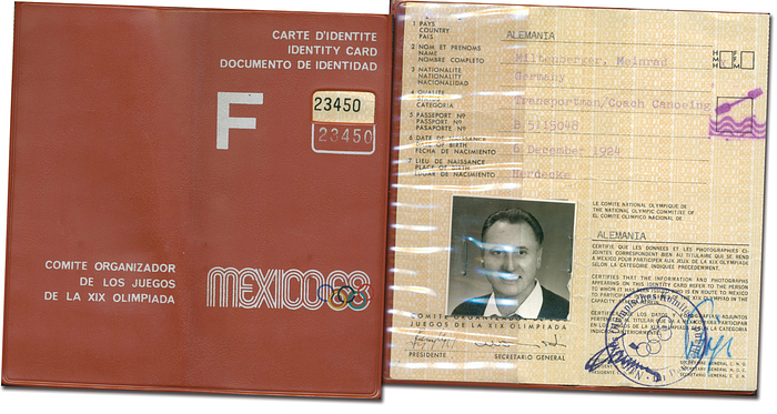  - "Carte d'Identitá. Identity Card. Mexico 68." Official participant's ID card for the 1968 Summer Olympics for Meinrad Miltenberger (1924-1993; GER) with photograph. Miltenberger won gold in canoeing at the 1956 Olympic Games and was world champion in 1958. At the 1968 Olympic Games, he was a coach for the German canoeists. ID card in original plastic folder. 4 pages, 13.5 x 6.5 cm. Condition: B-C