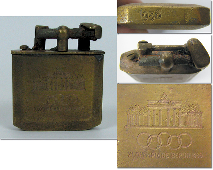 Feuerzeug 1936  | Messingfeuerzeug mit gravierter Inschrift "IX.Olympiade Berlin 1936", Olympischen Ringen und dem Brandenburger Tor. Bodengravur "1936". Für Benzingebrauch. 4,8x4x1 cm.