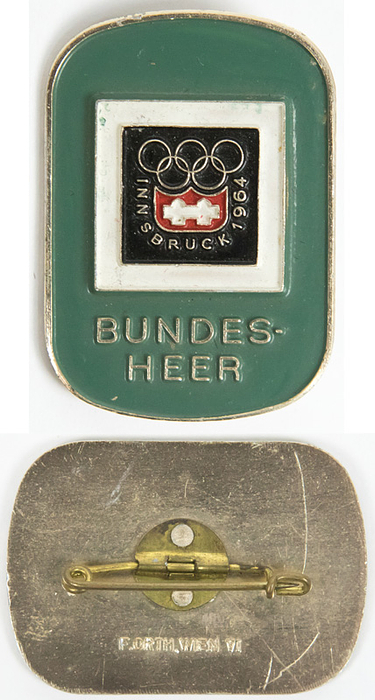 Teilnehmerabzeichen 1964  | Teilnehmerabzeichen für die Olympischen Winterspiele Innsbruck 1964 „Bundesheer“. Aluminium, mehrfarbig emailliert, 4,2 x3 cm.