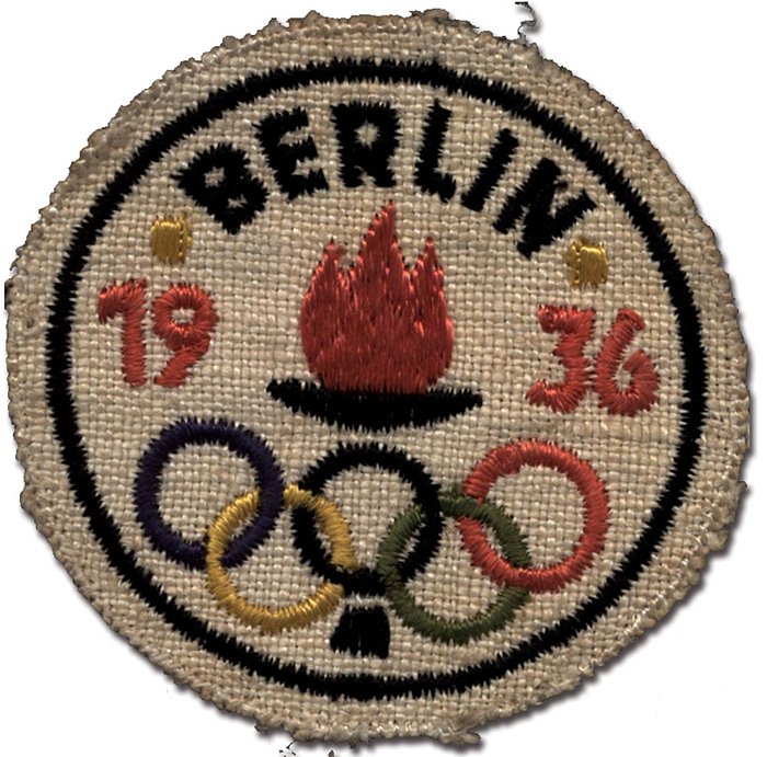 Stoffabzeichen 1936  | Farbig besticktes Stoffabzeichen "Olympia 1936" mit der Olympischen Flamme und den Ringen. Leinen.7,5 cm.