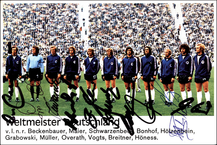  - Autogramme: World Cup 1974.  German Team Photo: Colour Bergmann sticker album of World Champion Germany 1974 with 11 unique autographs of the players who played the final. 15x10.5 cm. --backside with signs of glue Condition: B
