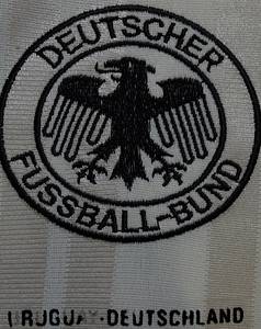  - Original match-worn DFB (German Football Association) player jersey with the number 6, worn by Guido Buchwald. Worn in the international match against Uruguay on December 20, 1992, in Montevideo, Uruguay. The shirt comes from the collection of a former DFB employee. Condition AAB (Class A, Condition AAB). Short-sleeved shirt; size L; DFB logo embroidered by hand; Adidas logo in foam; felt match detail; player number applied using the wet flocking process; Adidas Equipment; 72% polyester, 28% triacetate; Made in Portugal; Condition: A - Bild 7