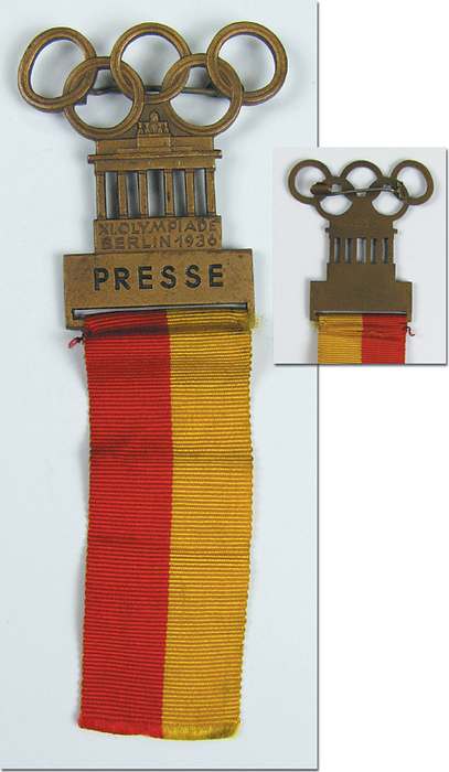 Teilnehmerabzeichen 1936  | Teilnehmerabzeichen „PRESSE“ für die Olympischen Spieler Berlin 1936. Bronze. Rot-gelbes Band, 11x4,1 cm.