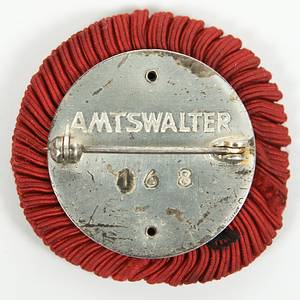  - 1936 Winter Olympic Games, Garmisch-Partenkirchen. Participant badge for an official of the Organizing Committee. Silver-plated bronze. Multi-colored enamel; reverse engraved "Amtsalter 168." With red fabric rosette. 4 x 3.5 cm. --Ebel-W-007 — Back with light scratches Condition: A- - Bild 3