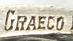 Siegermedaille 1908  | Siegermedaille von Alexander Petrow (1876-1941; Rußland Zarenreich) für den 2.Platz im Ringen Griechisch - Römisch Schwergewicht bei den Olympischen Spielen London 1908 mit der Aufschrift "Olympic Games London". Silber (21,56 Gramm), mit Randgravur "Second Prize Heavy Graeco - Roman Wrestling" und Randpunze "Vaughton", 3,3 cm. Sporthistorische Rarität! - Bild 6