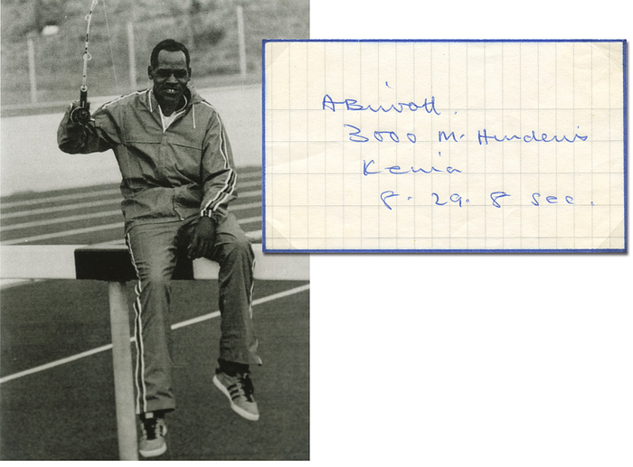 Biwott, Amos  | Blancobeleg mit Originalsignatur von Amos Biwott (KEN). Goldmedaille Olympische Spiele 1968 über 3000 m, 10x6 cm.