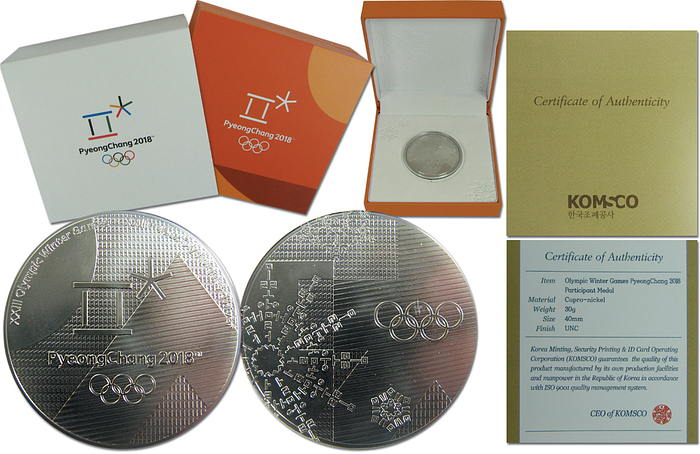  - Olympic Winter Games 2018: Official participation medal for athletes from the Olympic Winter Games in PyeongChang 2018 inscribed "XXIII Olympic Winter Games PyeongChang 2018",brass-nickel (30 grammes), 4 cm. In original plastic sphere in a cardboard box which is covered with white embossed velvet. Plus original white slipcase with colour inscription  "PyeongChang 2018" Plus a certificate of authenticity which confirms this medal as a participation medal. This medal was presented only to athletes at the Olympic Winter Games in PyeongChang 2018. Extremly rare, extra fine. Condition: A