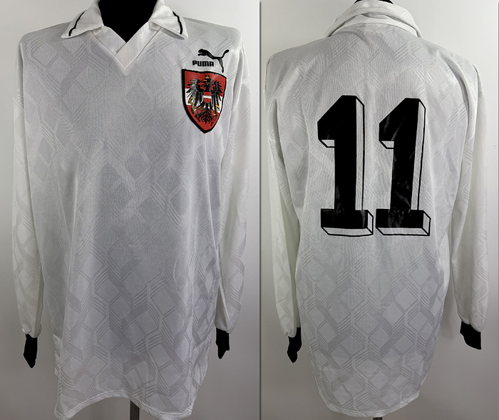  - Original match-worn Austrian player shirt with the number 11, worn by Andreas Herzog. Worn in the international match against Germany on November 18, 1992, in Nuremberg. Condition: AAB. The teams wore black armbands in honor of Ernst Happel, who died on November 14, 1982. Long-sleeved shirt; size XL; national team emblem sewn on, Puma manufacturer's logo applied; player number rubberized; 100% polyester; Made in Germany; The jersey comes from the collection of a former DFB official. Condition: A-