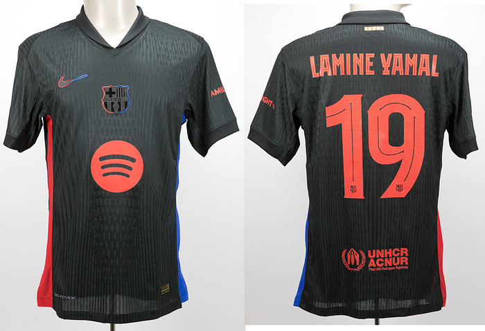  - Original match issued FC Barcelona player shirt with the number 19. Prepared for a Champions League match for Lamine Yamal, 2024/2025 season. Short-sleeved shirt; size M, club crest and manufacturer's logo applied; chest sponsor, player name and number rubberized; Champions League logo and Foundation logo flocked; sleeve sponsor rubberized; 100% polyester; Made in Thailand. Condition: A