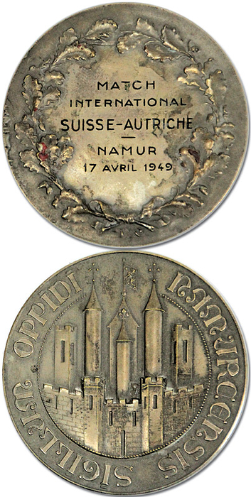  - Official international match medal for the match between Switzerland and Austria on April 17, 1949. Silver-plated bronze, engraved: Match international Suisse – Autriche. Namur, 17 avril 1949. 6 cm. --Jiri Sobotka, the successful coach of FC La Chaux-de-Fonds, was present at this match as the Swiss players' team official and therefore received this medal.The consignor acquired this medal directly from the estate of Sobotka! Jiri Sobotka—also known as Georges Sobotka (1911–1994)—was the 1934 World Cup runner-up. He earned a total of 23 international caps for Czechoslovakia. With Slavia Prague, he won the national championship six times and claimed the Mitropa Cup in 1938. In 1946, he moved to Switzerland, where he served as player-coach for FC La Chaux-de-Fonds, winning the league title five times. In 1959, he moved to Feyenoord Rotterdam as a coach, leading the team to the Dutch championship in 1961. Condition: A-