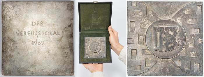  - Winner's medal belonging to Reinhard "Stan" Libuda, awarded as a player for Schalke 04 for finishing in 2nd place in the 1969 DFB-Pokal following the final match held on June 14, 1969, in Frankfurt (Bayern Munich 2–1 Schalke 04). Heavy bronze plaque (1.4 kg, silver-plated) inscribed "DFB Vereinspokal 1969." 12.5 x 12.5 cm. Housed in its original presentation case. --The players of Bayern Munich received the same medal, albeit gold-plated. Only 22 silver-plated medals were issued to the players of Schalke 04. --This item comes directly from the estate of Reinhard "Stan" Libuda (1943–1996). 3rd Place – 1970 FIFA World Cup. 26 Senior International Caps (DFB). 289 Bundesliga Matches (Schalke 04 + Borussia Dortmund). European Cup Winner 1966 (with Dortmund). DFB Cup Winner 1972 (with Schalke). German Vice-Champion 1966 (BVB) + 1972 (Schalke). The item is supplied with a Certificate of Authenticity (COA)! Condition: A-