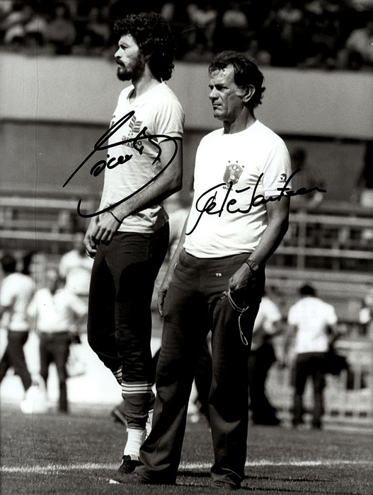  - Autograph World Cup 1982 + 1986: (1954–2011) Black-and-white press photo with original signatures from Sócrates and the Brazilian national coach Telê Santana (1931–2006). Both participated in the 1982 and 1986 FIFA World Cups with Brazil. 15 x 10 cm Condition: A