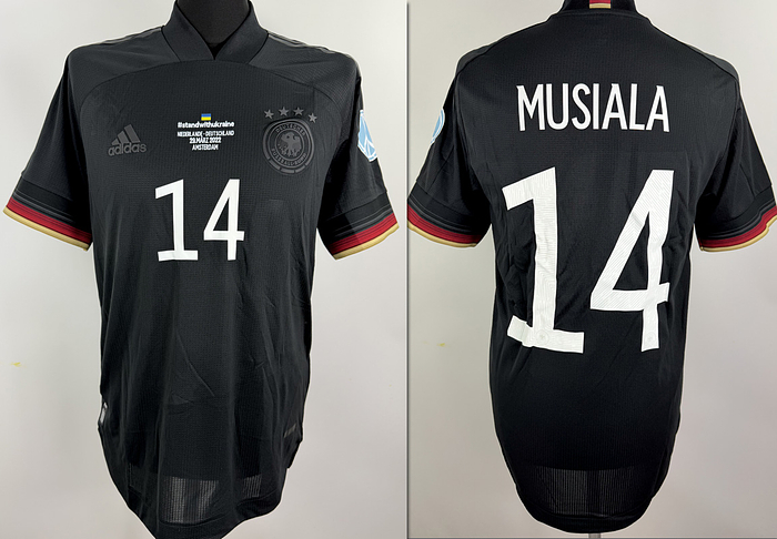 DFB  - Trikot 2022  | Original match issued DFB Spielertrikot mit der Nummer 14. Getragen von Jamal Musiala  im Freundschaftsspiel Spiel gegen Niederlande am 29.03.2022 in Amsterdam.Trikot hat den Sonderprint "StandwithUkraine" um solidarität mit der Ukraine zu zeigen. Status: AAB