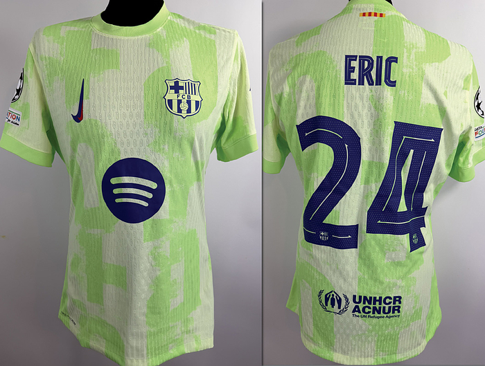  - Original match issue FC Barcelona player shirt with the number 24. Prepared for a Champions League match for Eric Garcia, 2024/2025 season. Status ABC. Short-sleeved shirt; size L, club emblem and manufacturer logo applied; chest sponsor, player name and number rubberized; Champions League logo and Foundation logo flocked; sleeve sponsor rubberized; 100% polyester; Made in Thailand. Condition: A