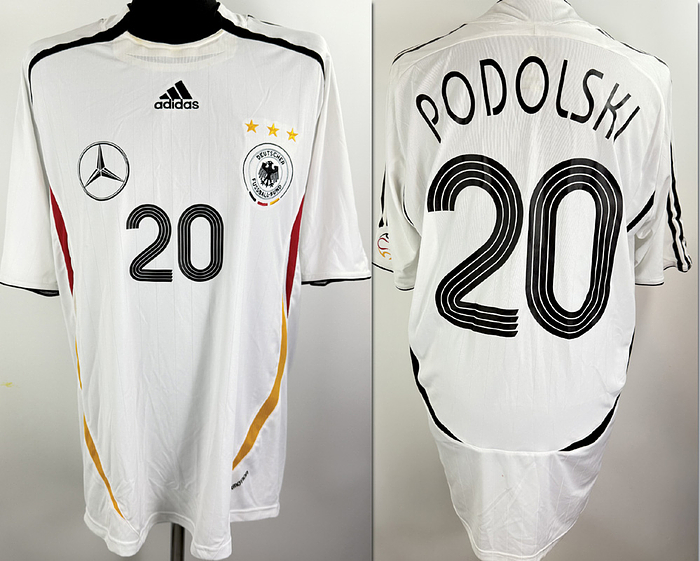 match worn football shirt DFB 200 - Original match-worn DFB player shirt, number 20, belonging to Lukas Podolski. Worn during the warm-up match against FSV Luckenwalde on May 16, 2006. What makes this shirt particularly special is the fact that the sponsor at the time—"Mercedes-Benz"—was also printed onto the shirt. Status: AAB. Short-sleeved jersey; Size XL; Embroidered club crest; Embroidered Adidas manufacturer logo; Rubberized sponsor print, player number, and player name; 100% Polyester; Made in China. Condition: A