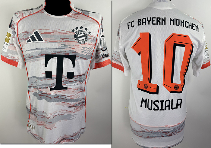 match issued football shirt FC Bayern 2025 - Original match-worn FC Bayern player shirt, No. 21, belonging to Jamal Musiala. Worn during a Bundesliga match in the 2025/2026 season. Status: AAB. Short-sleeve shirt; Size 6; Club crest and Adidas manufacturer logo applied; Sponsor 'T...', club name, player number, and player name applied in rubberized print; Back number height: 25 cm; Bundesliga patch and Allianz patch applied in rubberized print; 100% Polyester; Made in Thailand; The jersey comes from an employee of Bayern Munich. Condition: A