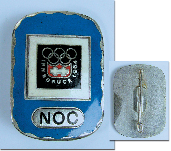  - Participation badge:Olympic Games 1964 NOC badge Olympic Games 1964 Athletes. Bronze, with coloured enamel, red background, Olympic Emblem and the word „NOC“ (National Olympic Commitee). Size 3,1x4.2 cm, very rare. Ebel -W-006. only  70 copies were awarded Condition: A-